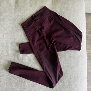 Burgundy Lululemon Leggings with mesh on the back of legs